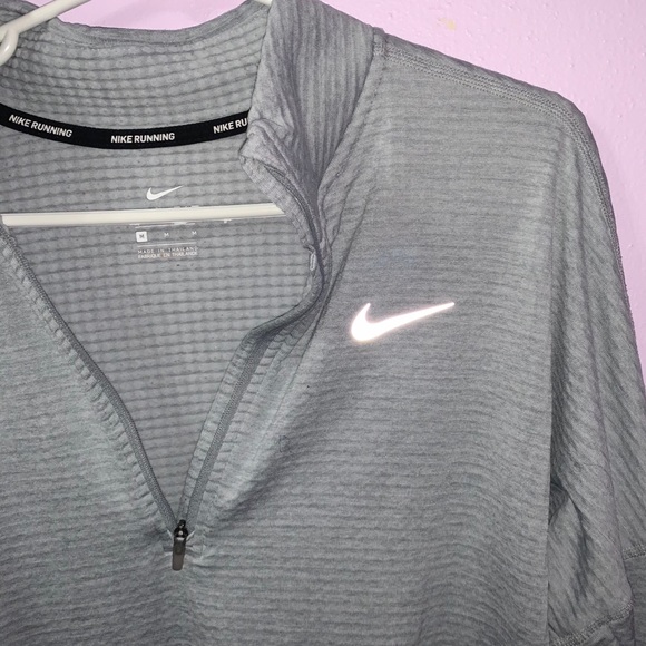 Nike Tops - reflective nike half zip top